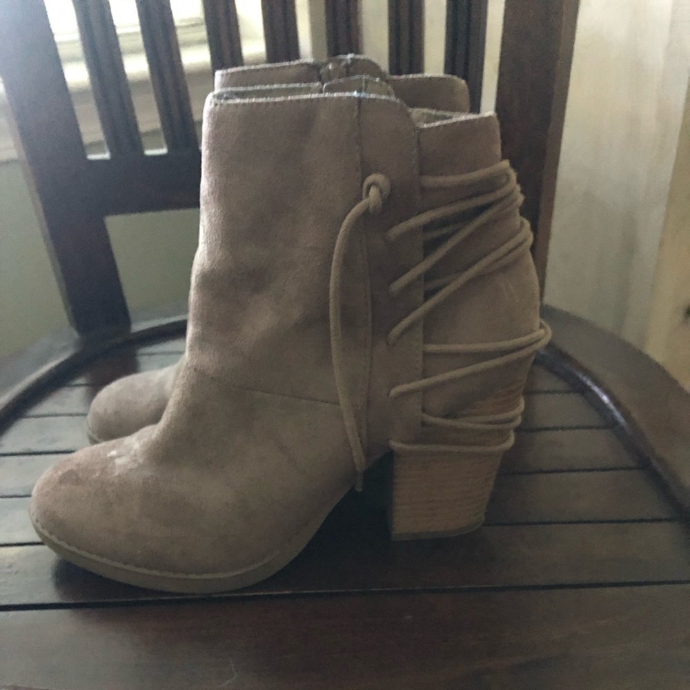Suede Ankle boots with zip up with detailed lacing on the back.